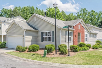 View of front of property with an attached garage,
