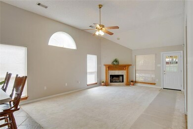 Large living room with 12' vaulted ceiling. Look t
