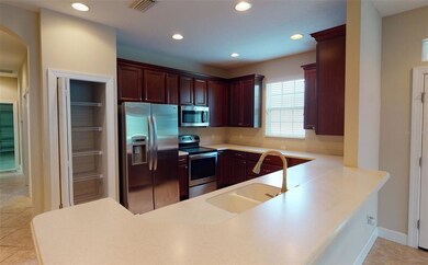 Kitchen showing pantry closet.