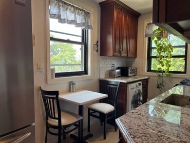 EIK granite counter, 2 windows,