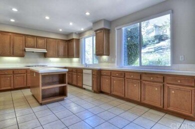 Enjoy the backyard views from your sunny kitchen.