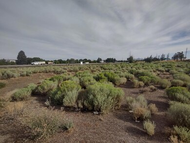 Bordering Hwy 97 facing N