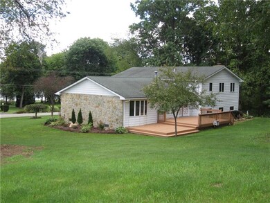 SITUATED ON THE CENTER OF 3 LOTS THIS LAKE HOME HA