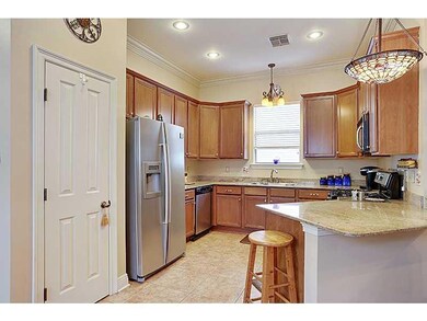 Kitchen. Kitchen has High Ceilings, Gas Stove, Gra