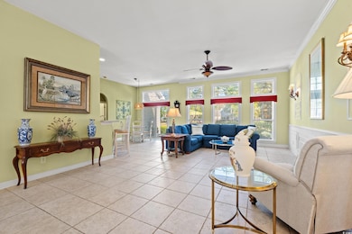 Living area featuring light tile patterned floors,