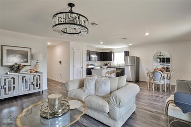 Living room featuring hardwood / wood-style floori