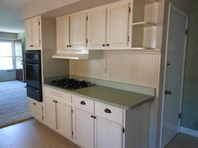 Full wall cooking/prep area with gas cook top.  Ni