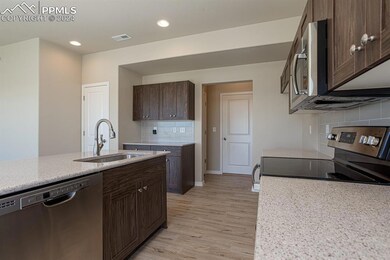 Photos are from a previous built home. Options may