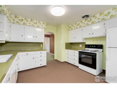 Plenty of kitchen cabinets, plus a pantry (pantry door not visible in this image).