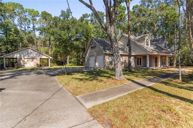 100 Ranch Road showing main house and barn.