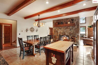 Large eat-in kitchen with fireplace and island.