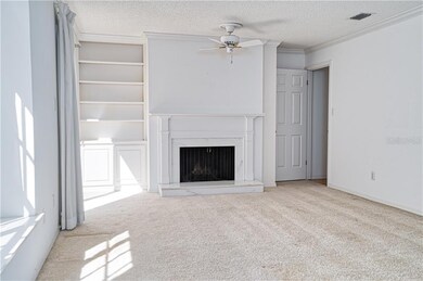 Front Living Room with Fireplace door exits into k