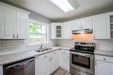 Fully remodeled kitchen with marble counters, stai