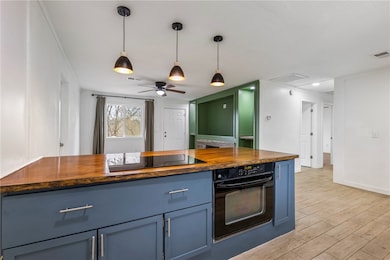  This beautifully updated kitchen is truly the hea