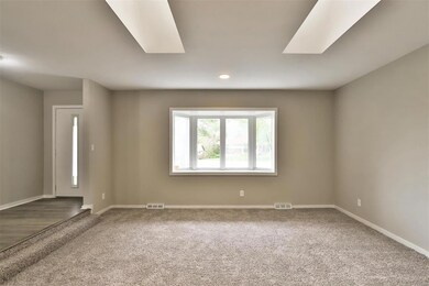 Living room and entry view as seen from the dining