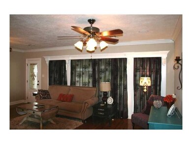 Living Room. Original wood floors restored to orig
