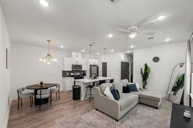 Modern elegance greets you in the inviting open-co