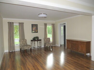 SPACIOUS LIVING ROOM ADJACENT TO THE DINING ROOM M