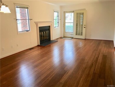 Rich colored wood floors in the Living and Dining 