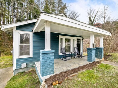 This charming, renovated Asheville bungalow feels like an urban oasis - in the middle of everything yet private and quiet! The unique location and zoning opens the potential to use property as an office, home office or ultra-convenient commute to wor