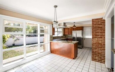EATING AREA / DINING ROOM WITH VIEW TO FRONT YARD.