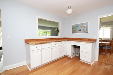 Abundance of cabinetry and counter space. Open pas