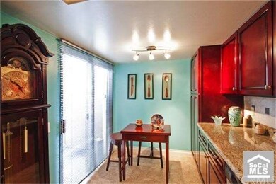 Rosewood cabinets with Granite Countertop
