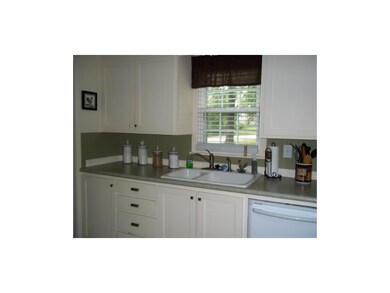 Custom cabinets and corian countertops.
