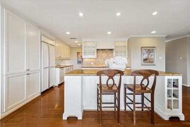 Remodeled Open Kitchen with eat-in island and cust