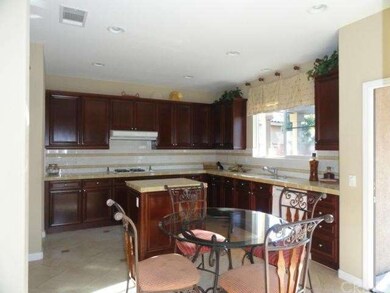 Kitchen with island and eating area