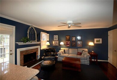 The family room has a gas fireplace and leads to t
