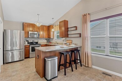 Kitchen with stainless steel appliances, breakfast