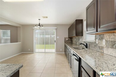 Bright open kitchen that overlooks the large back