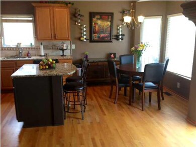 Gathering place in kitchen area beyond the Granite