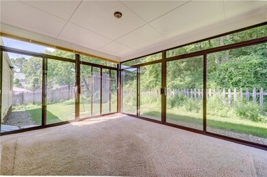 Glass-enclosed 3 Seasons room.