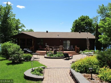 paver sidewalk to welcoming front deck