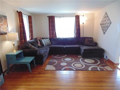 Living room--Gleaming hardwood floors and lots of 