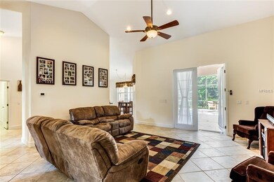 Living room to lanai and heated pool