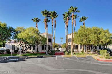 View of building exterior featuring uncovered park
