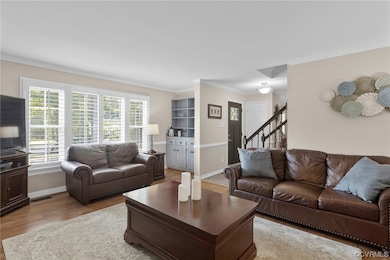 The Family Room looking back to the front door.  Note the Plantation Shutters that are throughout the 1st floor!