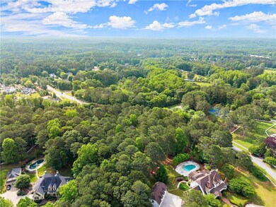 View of property location with a forest