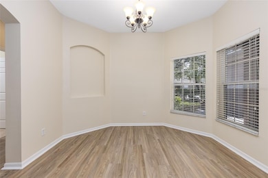 Dining Room With Multiple Windows For Natural Lighting