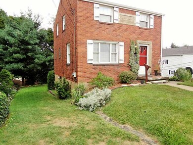 Exterior Front. The driveway is now grass but lead