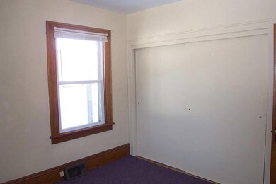 Main floor bedroom with loads of sunlight!