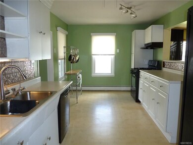 Bright natural light with ample counter tops makes this kitchen a joy to be in.