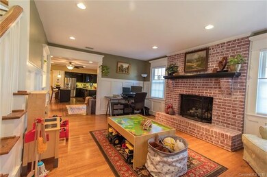 Family room with steps to left to go up and lookin