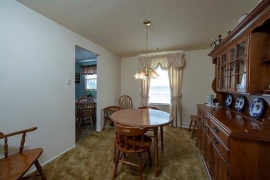 The formal dining room also features wall to wall 