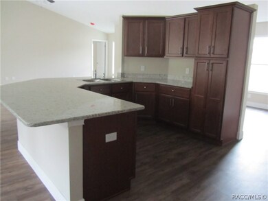 View of kitchen and living from nook
