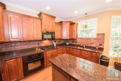 Kitchen with built-in microwave