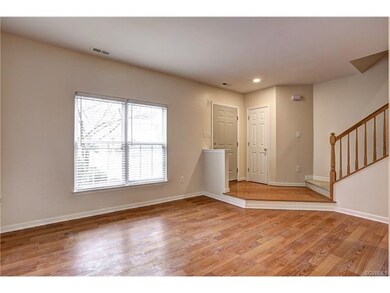 Open foyer leads into living room. Offset stairs h